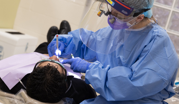A patient receives dental care at the NWTC Dental Clinic
