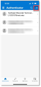 Phone authenticator app screen with "+" button highlighted