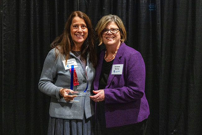 Alumni Award winner with NWTC president, Dr. Kristen Raney