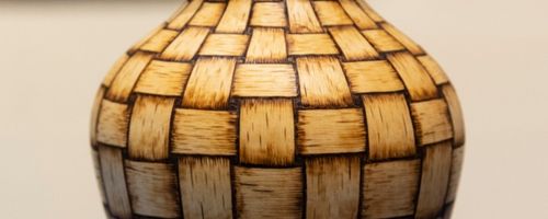 Close-up view of a wooden vase