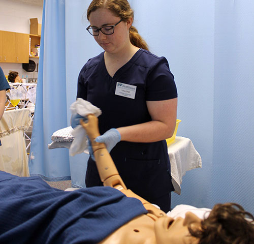 Wrightstown student learns from a patient simulator