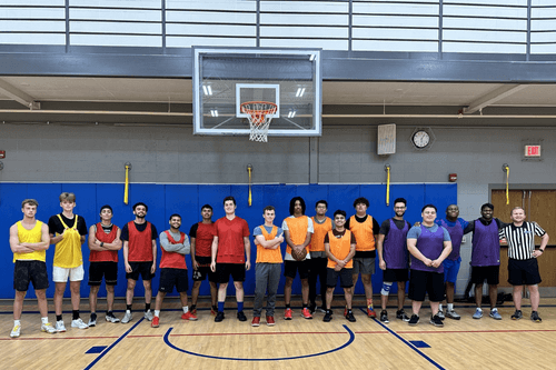 Students pose for basketball group photo