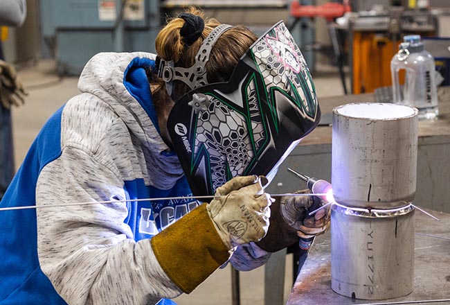 Welder creating a sculpture