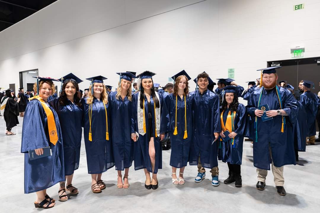 Gregurich's Justice and Community Advocacy program class at graduation.